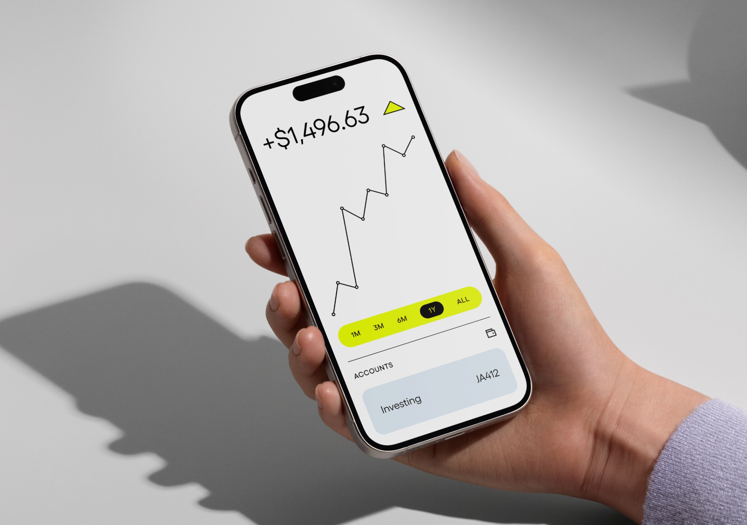 EQX investing app on a phone showing a rising portfolio chart, a time-range filter and an account balance